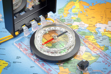 Compass on a world map