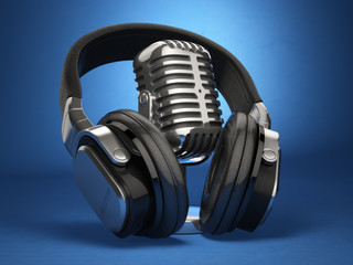 Fototapeta na wymiar Vintage microphone and headphones on blue background. Concept au