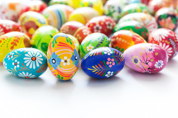 Traditional hand painted Easter eggs on white. Spring patterns