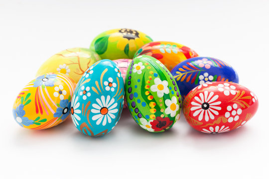 Traditional hand painted Easter eggs on white. Spring patterns