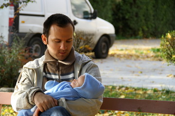 Man holding a baby boy
