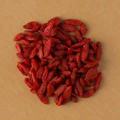 Circle of dry red goji berries