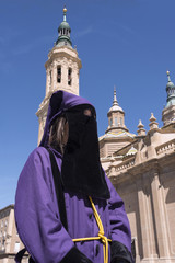 Fototapeta premium Penitent at the Basilica del Pilar. Zaragoza. Spain