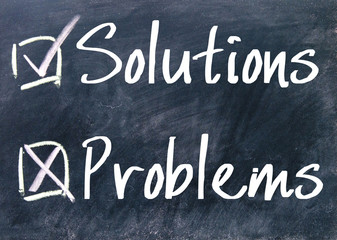 Fototapeta premium solutions or problems choice on blackboard