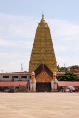 Fototapeta na wymiar Burmese temple with lion in Sangkhlaburi, Thailand