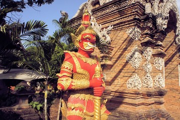 Fototapeta premium Standing Buddhist Gnome statue in Northern Thailand