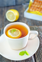 tea with lemon and waffle