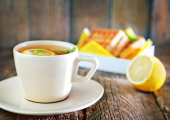 tea with lemon and waffle