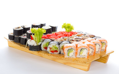 Sushi set on wooden plate