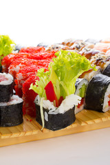 Sushi set on wooden plate