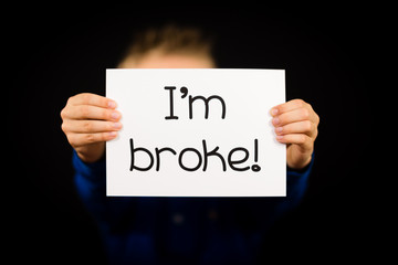 Person holding I am broke sign