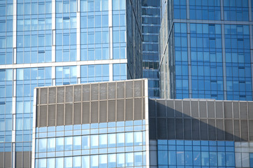 Skyscrapers in modern office business cluster. Close up view