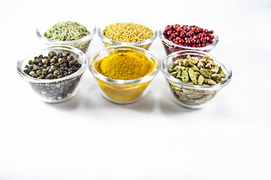 colorful spices in glass containers