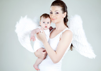 Beautiful woman with a baby angel