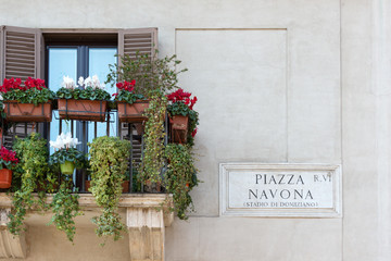 Piazza Navona sign on historic italian building in Rome