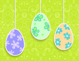 Easter background with hanging on the ropes eggs