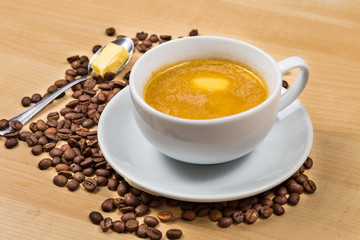 Coffee with milk and added butter