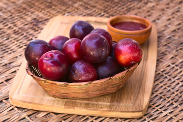 Woven basket filled with satsuma plum