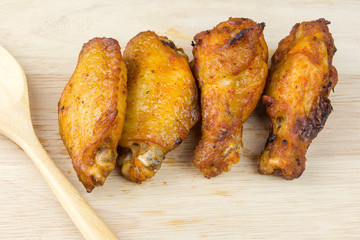 Chicken wings on wood board