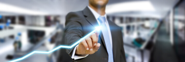 Businessman in his office using tactile interface