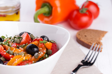 Hot salad from roasted sweet pepper