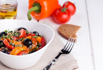 Hot salad from roasted sweet pepper