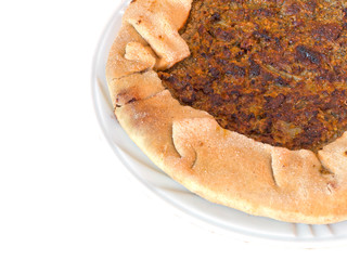Torta di erbe - rustic Italian vegetable pie isolated on white