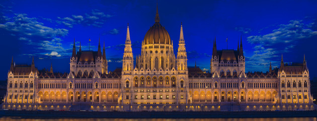 Panorama of Budapest Parliament building at night in Hungary