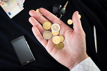 coins on the male palm