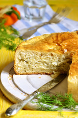Traditional russian yeast pie with cabbage and dill.