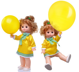 Fototapeta na wymiar Vintage doll in yellow dress with baloon set