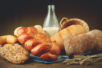 Bottle of milk and baked bread