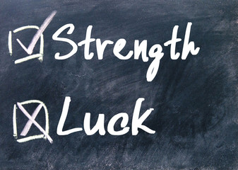 Obraz premium strength or luck determine