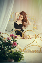 sexy girl in lingerie lying on white bed © Poter_N