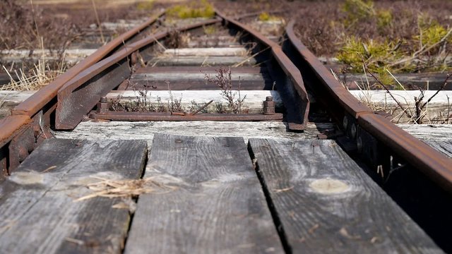 railroad switch is moving from one track to another