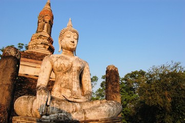 Fototapeta na wymiar Ancient buddha statue. Sukhothai Historical Park