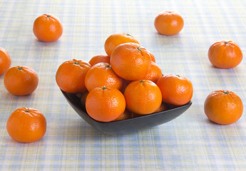 Fresh orange fruits on a table