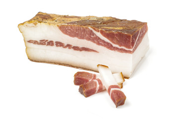 Smoked bacon and three sliced peaces isolated on the white