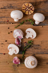 Fototapeta na wymiar Ingredients with fresh mushrooms on burlap background