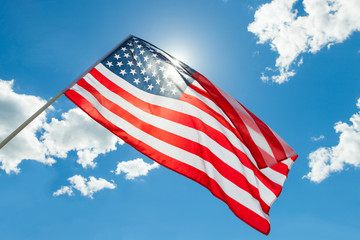 Fototapeta premium USA flag with clouds - outdoors shoot