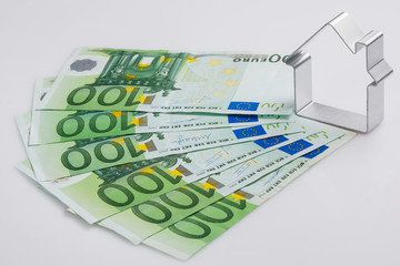 Shape of house and money