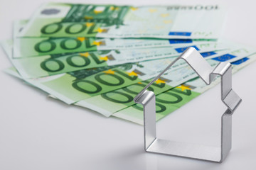 Shape of house and money