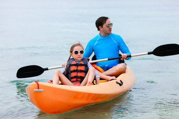 Father and daughter kayaking