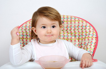 adorable little baby eating