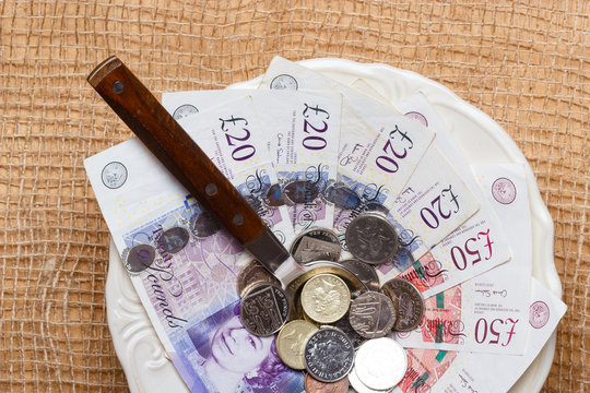 British money on kitchen table, coast of living