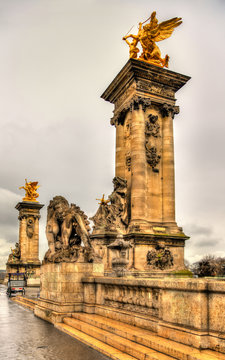 Sculptures at the entrance to the Pont Alexandre III in Paris