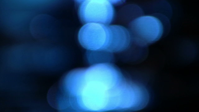 Abstract blue bokeh shiny water background
