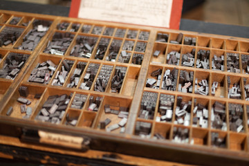 Metal letterpress letters in printing machine