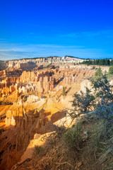 Fototapeta na wymiar Line of Long Sandstone Cliffs of Bryce Canyon National Park in t