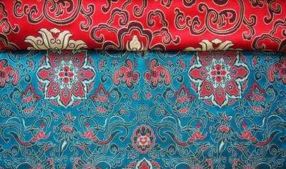 red and blue fabric with asian pattern
